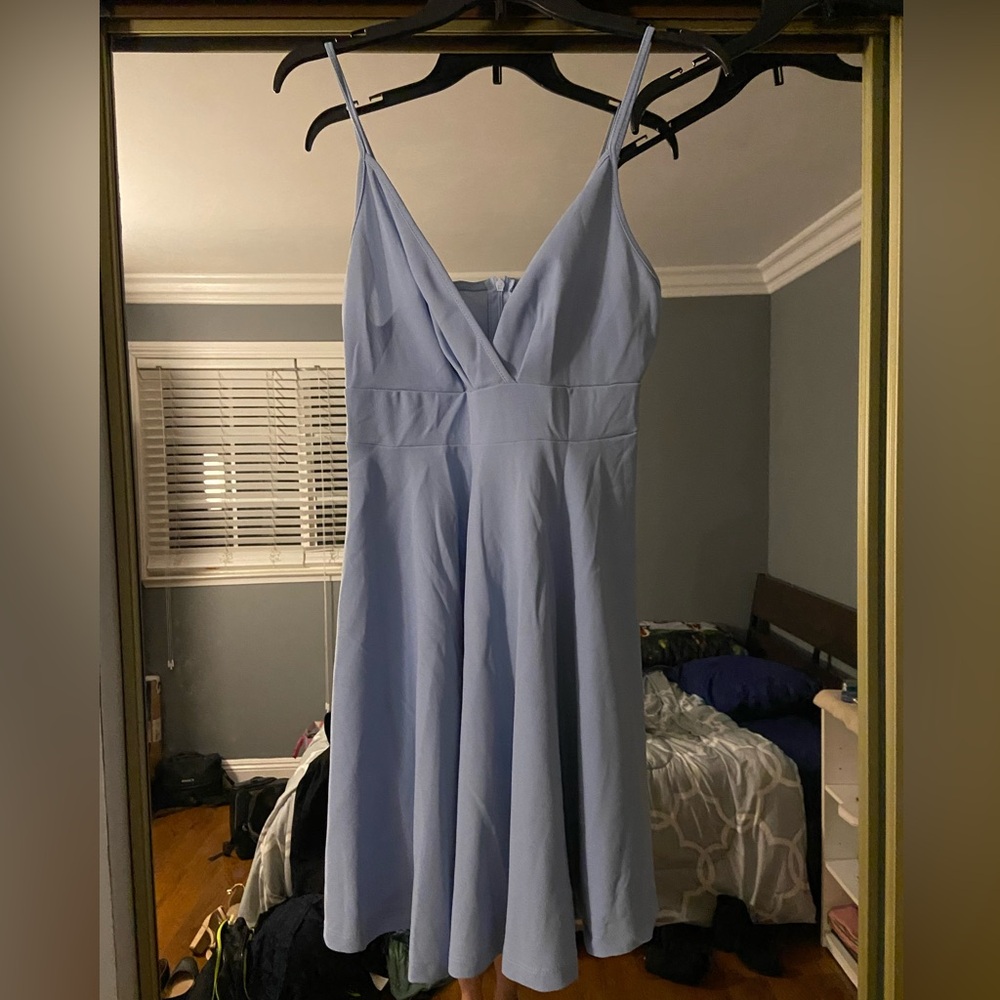 Baby blue short dress. Spaghetti straps, flared, high waisted. Never worn